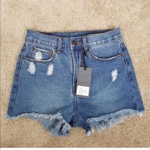 Denim CoLab raw hemmed shorts